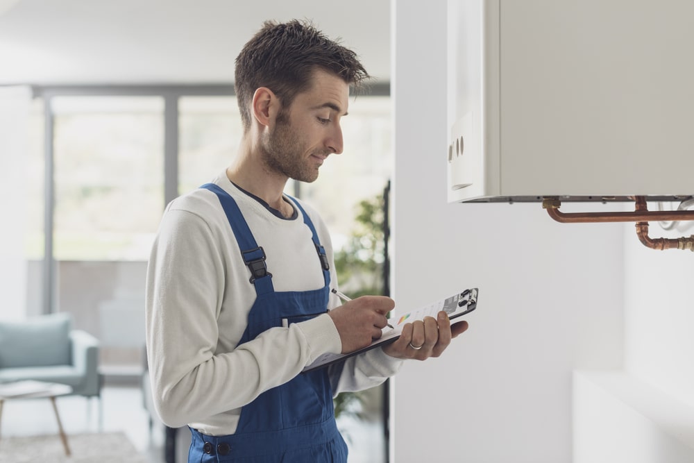 professional doing a boiler check