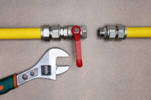 gas tube with wrench. concept of repairing gas pipeline.